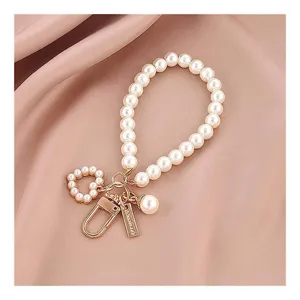 Elegante portachiavi con perle finte, parti metalliche dorate e ciondolo per borse e chiavi.