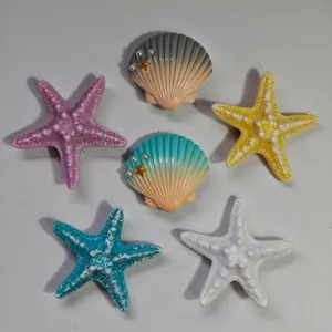 Ocean series beach bag charms detail, seashell and starfish buttons with pearls.