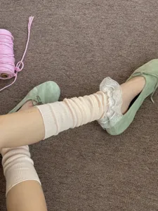 Sweet Japanese style lace ruffle leg warmers detail shot, cute pink knit socks for women.