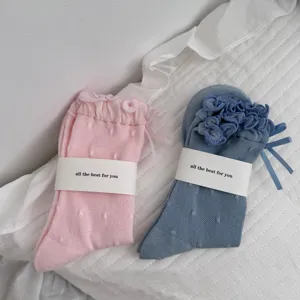 Cute ruffles mid-calf socks with sweet bows and dotted details, soft breathable cotton.