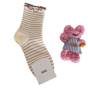 Sweet ruffles striped mid-calf socks for women, cute cotton crew socks with hanging tag.