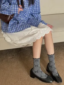 Japanese style grey mid-calf socks with cute black bow patterns, breathable cotton casual hosiery.