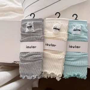 Soft knitted leg warmers sweet candy color Japanese style ribbed leg covers for women daily wear.