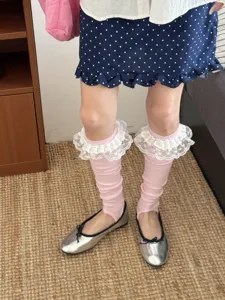 Pink ruffled stirrup socks detail, sweet style leg warmers with delicate lace trim for summer wear.
