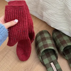 Detailed view of women thick wool speckle mid-calf socks, cozy winter warm slouch sock.