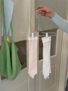 Summer thin stirrup socks for women, fashionable ruffled trim leg warmers in pink and white.