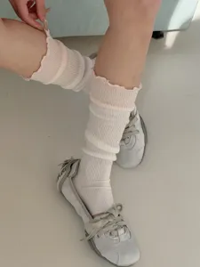 Korean style ruffles stacking socks with pink contrast trim, soft breathable cotton leg warmers for women.