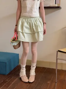 Japanese sweet style ruffle miniskirt set with dot top, lace stockings and cute leg warmers.