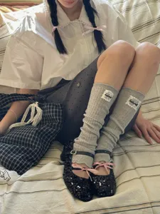 Japanese style grey knit leg warmers for women, soft and cozy accessory for autumn and winter outfits.