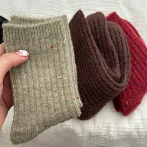 Thickened cashmere speckled mid-calf wool slouchy socks detail, warm winter cozy knit hosiery.