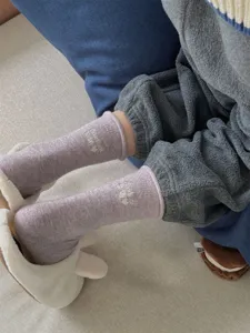 Cozy wool blend pile socks with cute embroidery text design for women winter warm wear