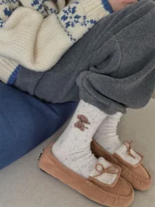 Cozy autumn winter women wool speckled mid-tube socks featuring cute brown puppy pattern.