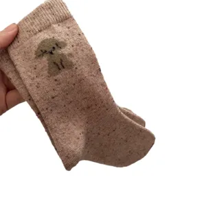 Cute wool speckled dog mid-tube socks for women, cozy winter warm casual hosiery.