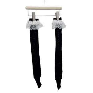 Black stirrup slouch socks with white lace ruffles, stylish women casual hosiery.