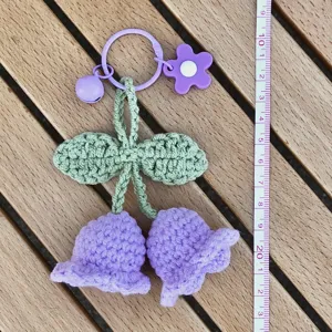 Handmade crochet lily of the valley keychain pendant, cute floral bag and car hanging accessory.