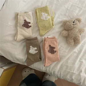 Cute mid-tube socks featuring plush dog and bear patterns, soft and cozy cotton casual daily wear.