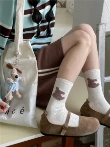 Cute fluffy dog pattern mid-tube socks detail shot, casual style daily wear comfort fit.