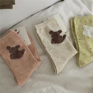 Cute fluffy bear applique mid tube socks detail, cozy daily wear and soft cotton fabric style.