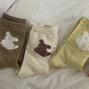 Cute plush dog pattern mid-calf socks for women, soft and stylish dopamine hosiery for daily wear.