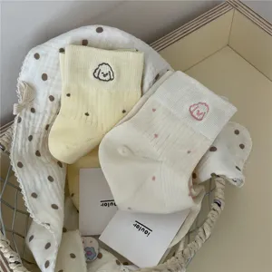 Cute cotton short socks for kids with adorable puppy embroidery and playful polka dot patterns.