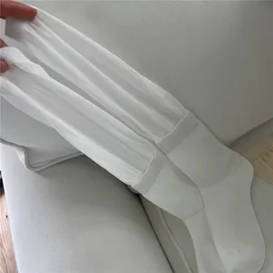 Detailed close-up view of white mesh long socks, showing soft breathable hollow texture.