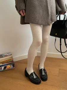Winter cute speckled tights for women, stylish fleece lined warm pantyhose for daily wear.