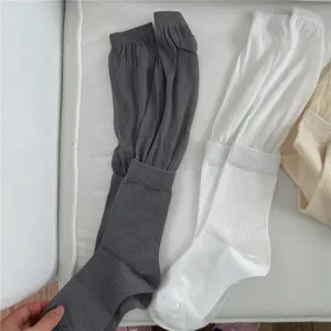 Soft ribbed slouch socks detailed close-up shot, comfortable daily wear hosiery style.