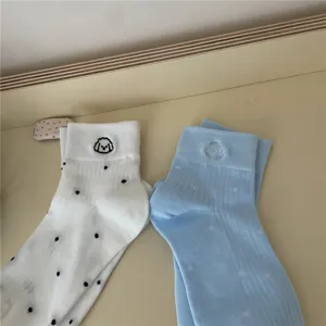 Detail view of cute polka dot short socks with puppy embroidery soft breathable casual style
