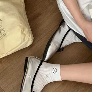 Cute polka dot short socks with sweet dog embroidery, soft breathable casual footwear detail.