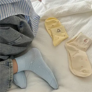 Comfortable dot seamless short socks with cute puppy embroidery for daily casual wear.