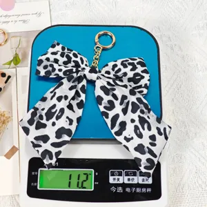 Porte-clés nœud en tissu imprimé léopard pendentif de sac accessoire en métal 11g