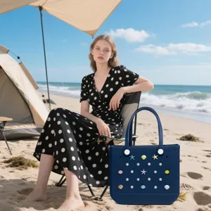 Navy blue EVA beach tote bag decorated with pearl and seashell charms for summer vacation.