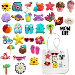 Colorful summer beach bag charms set with cute PVC accessories and white tote bag detail.