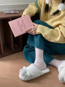 Cozy winter thick striped mid-tube socks for women, soft knit cozy warm hosiery detail.