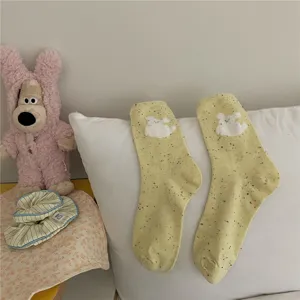 Cute dog patch mid tube socks for women, sweet yellow speckled trendy casual hosiery.