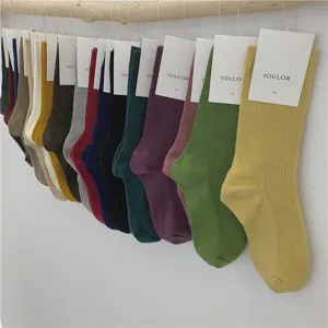 Chaussettes mi-hautes côtelées unies suspendues, bonneterie douce en coton tendance.