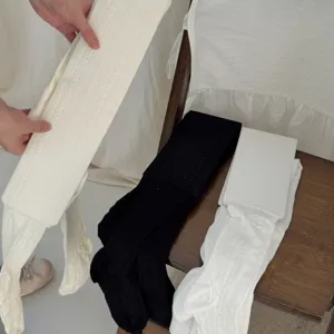 Dames gebreide panty kousen, zoete stijl dagelijkse kleding in zwart en wit kleuren.