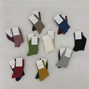 Chaussettes en coton mi-hautes unies pour femmes vêtements de loisirs colorés simples
