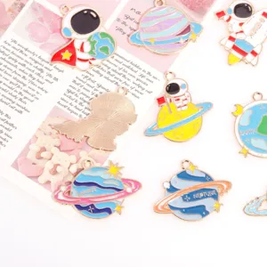 Astronaut planet enamel alloy charms pendants for DIY necklace earrings jewelry details.