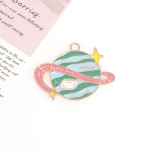 Metal enamel planet charm pendant DIY jewelry making accessory fine detail close-up view.