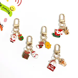 Cute Christmas keychain set with Santa snowman reindeer enamel charms for bag purse decor gifts