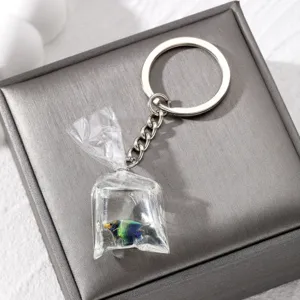 Cute tropical fish keychain in transparent water bag resin pendant for keys or bag decoration.