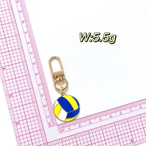 Vue détaillée du pendentif porte-clés en forme de volleyball avec affichage précis du poids.