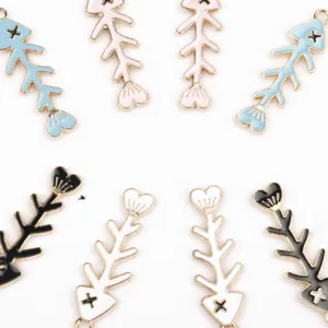 Colorful fish bone enamel charms close up detail, perfect for DIY jewelry making and crafts.