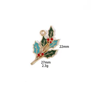 Christmas holly leaf alloy charm pendant detail shot, enamel drop oil jewelry accessory.