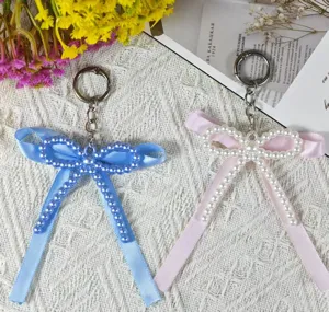 Handmade faux pearl double-layer bow keychain, sweet ins style bag pendant and accessory.