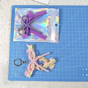 Handmade DIY imitation pearl double bow keychain cute pink purple bag pendant accessories