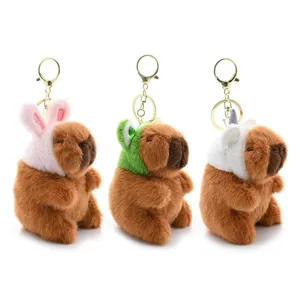 Cute capybara plush keychain set, soft animal hat pendant for backpack keys and car decoration.