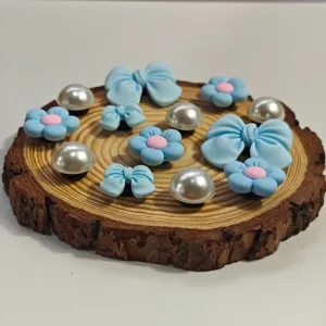Set di ciondoli fai da te per scarpe con fiocco blu e fiore per decorazione borse EVA.