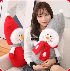 Close-up of cute Christmas snowman plush toy with scarf, cozy holiday decor scene in room.
